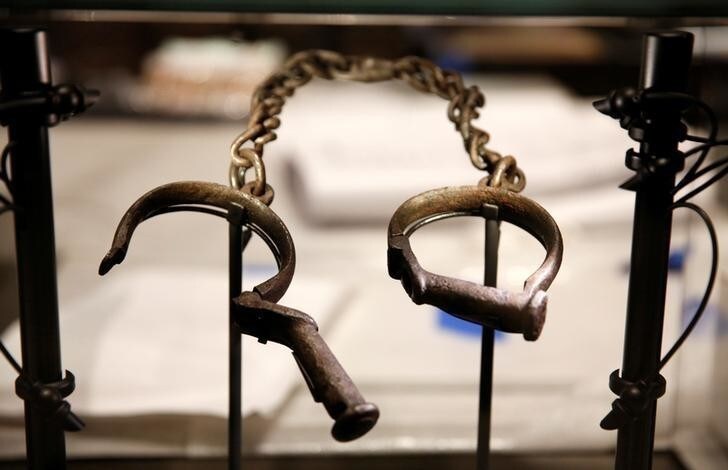 Slave shackles are seen in a display case during a media preview at the National Museum of African American History and Culture on the National Mall in Washington September 14, 2016. The museum will open to the public on September 24. REUTERS/Kevin Lamarque