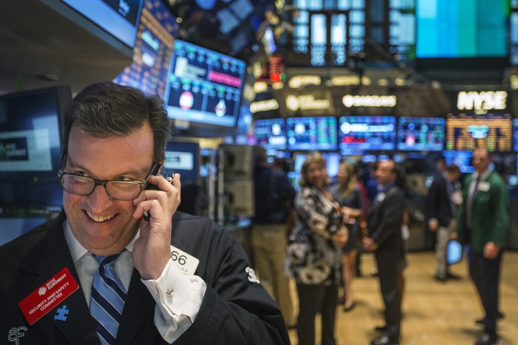 A trader works on the floor of the New York Stock Exchange shortly before the end of the day's trading in New York July america usa us united states women business businesswoman businessman corporation corporate finance wall street stock exchange capitalism private ownership board c-suite CEOs CFOs corporation united states us america wall street change gender parity equality goldman sachs davos industry representation fair finance fiscal financial economics economies trading trade price money profit value men male female change changing 2020 future taxation tax wealth gross domestic product gdp