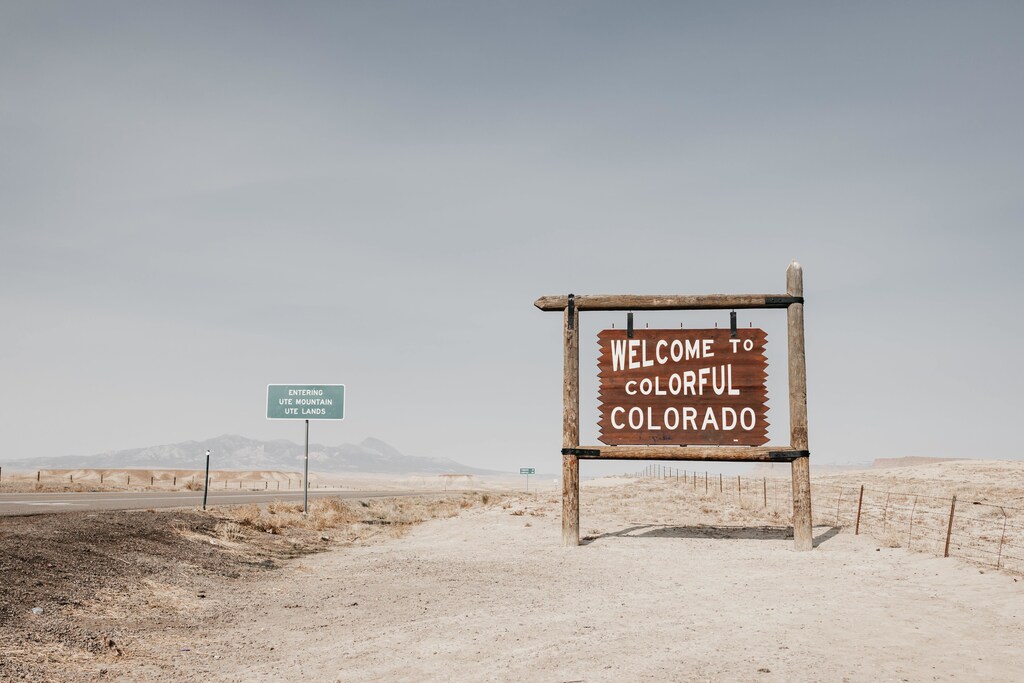 A desert sign in Colorado that reads "Welcome to Colorful Colorado".