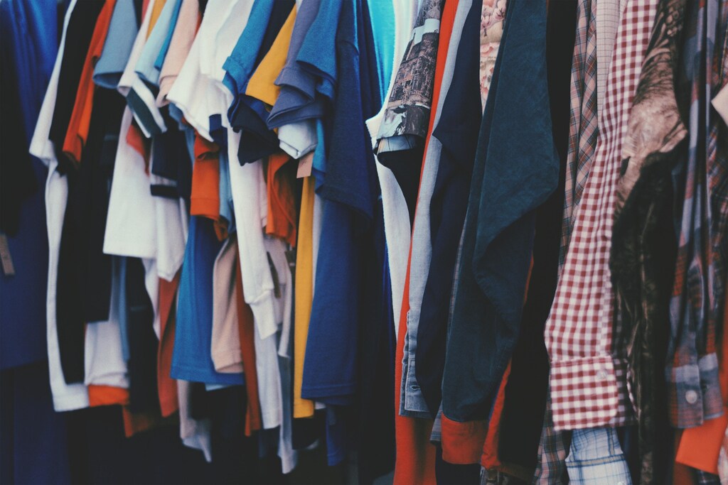 shown here is a rack of clothes. New fashion innovations are steering away from animal-based products and are sourced from a range of materials such as mushrooms and coffee grounds