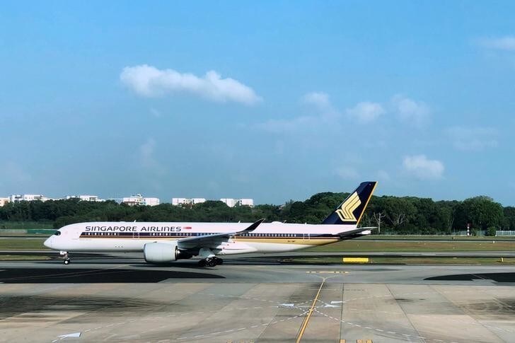 A Singapore Airlines (SIA) Airbus A350-900 passenger aircraft taxis to a gate at Changi Airport in Singapore April 9, 2018. REUTERS/Tim Chong