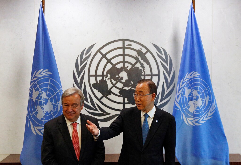 Secretary General-designate Antonio Guterres of Portugal (L) is greeted by current U.N. Secretary General Ban Ki-moon at the U.N. headquarters in New York City, U.S. October 13, 2016. REUTERS/Brendan McDermid - D1AEUGUGQDAA