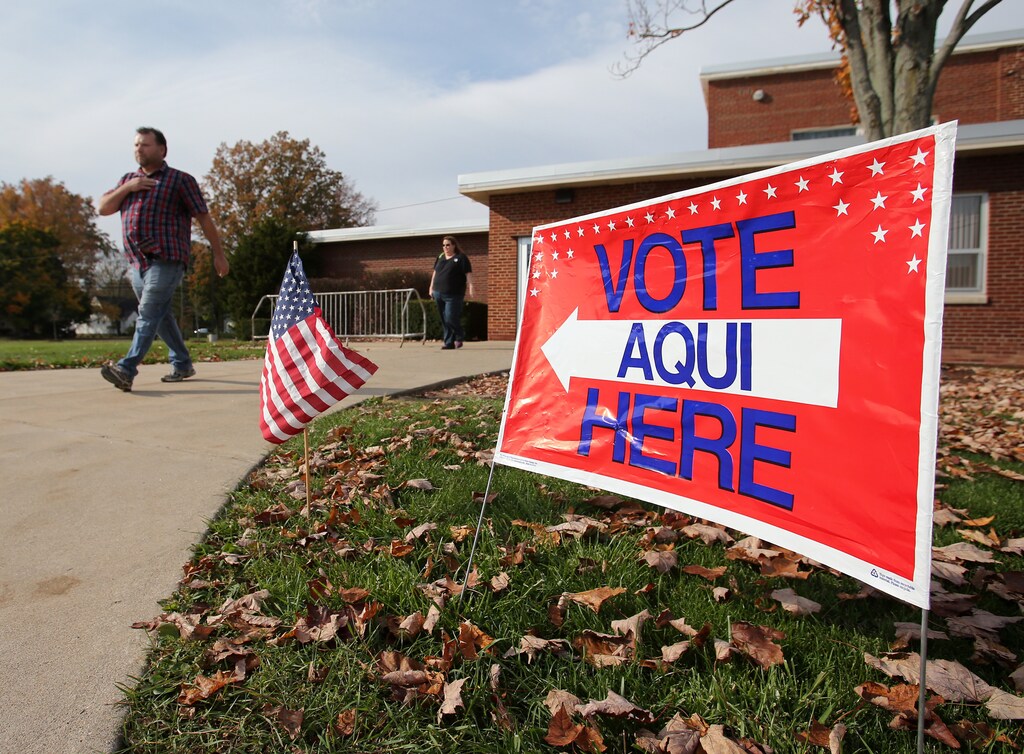 Voters leave a polling station after casting their votes during the U.S. presidential election in Olmsted Falls, Ohio, U.S. November 8, 2016. REUTERS/Aaron Josefczyk - RTX2SJWZ