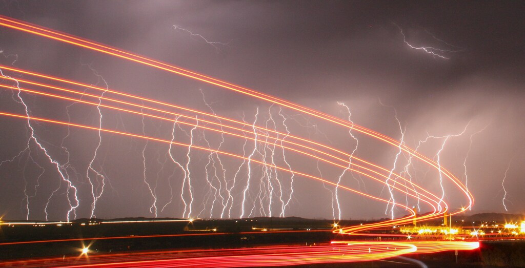 Mass lightning bolts light up night skies by the Daggett airport from monsoon storms passing over the high deserts early Wednesday, north of Barstow, California