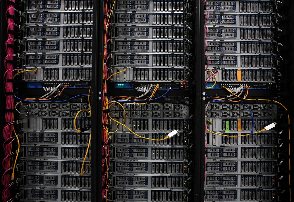 A view of server racks, GPUs and CPUs inside the Nebius AI UK data centre supporting responsible AI development, at Ark Data Centres in Chertsey, Britain, November 6, 2025. REUTERS/Toby Melville.