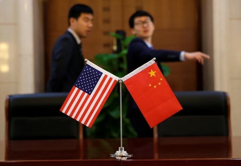 Chinese and US flags are set up for a signing ceremony during a visit by U.S. Secretary of Transportation Elaine Chao at China's Ministry of Transport in Beijing, China April 27, 2018. Picture taken April 27, 2018. REUTERS/Jason Lee - RC13D78E0020