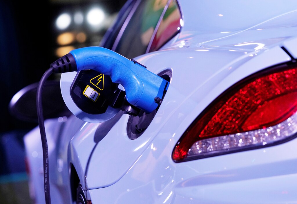 A electric charging port is seen attached to a 2018 Karma Revero, a plug-in hybrid vehicle, at the Canadian International AutoShow in Toronto, Ontario, Canada, February 13, 2019. REUTERS/Mark Blinch - RC18293DF3F0