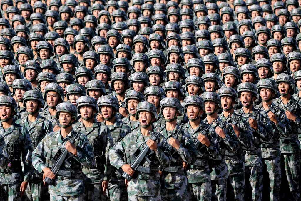 Soldiers of China's People's Liberation Army (PLA) get ready for the military parade to commemorate the 90th anniversary of the foundation of the army at Zhurihe military training base in Inner Mongolia Autonomous Region, China, July 30, 2017. China Daily via REUTERS ATTENTION EDITORS - THIS IMAGE WAS PROVIDED BY A THIRD PARTY. CHINA OUT. NO COMMERCIAL OR EDITORIAL SALES IN CHINA. TPX IMAGES OF THE DAY - RC142D1B0000
