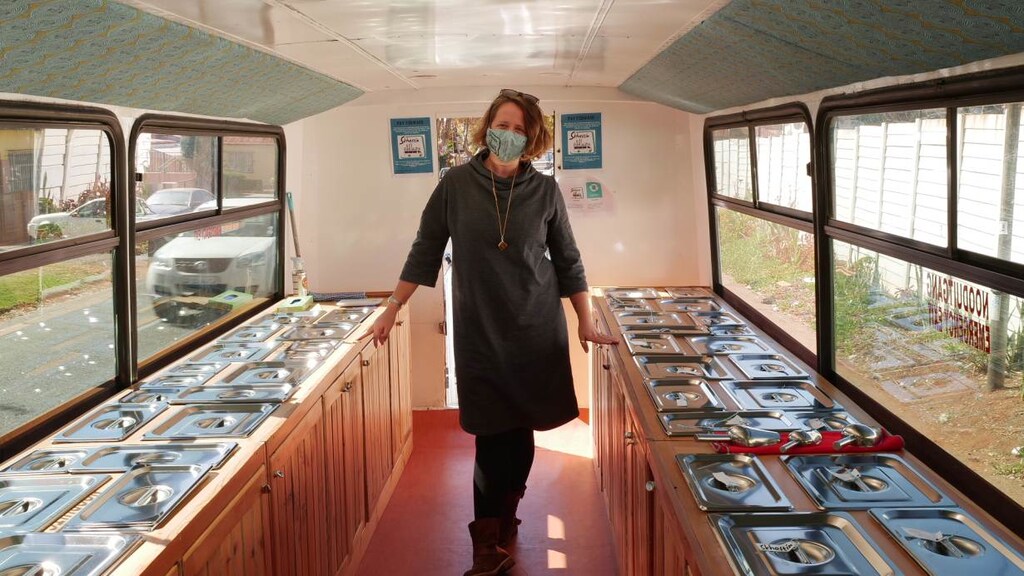 Ilka Stein, a consultant and facilitator, poses for a photo inside the Skhaftin food bus in Johannesburg, South Africa. May 18, 2021.