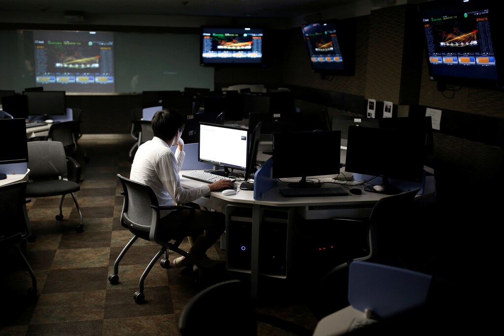 A student, who requested to be known only by surname Noh and his face not to be photographed due to security reasons, sits in front of a computer while demonstrating softwares during an interview with Reuters at War Room at The Korea University in Seoul, South Korea, June 16, 2016. REUTERS/Kim Hong-Ji TPX IMAGES OF THE DAY - S1AETKWVJQAA