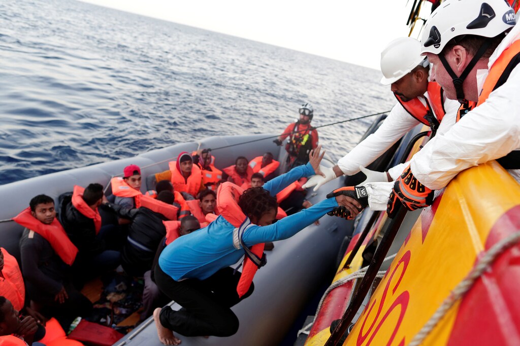 Migrants are seen during rescue operation in the Mediterranea Sea October 20, 2016. Yara Nardi/Italian Red Cross press office/Handout via Reuters ATTENTION EDITORS - THIS IMAGE WAS PROVIDED BY A THIRD PARTY. EDITORIAL USE ONLY. - D1BEUIBONMAC