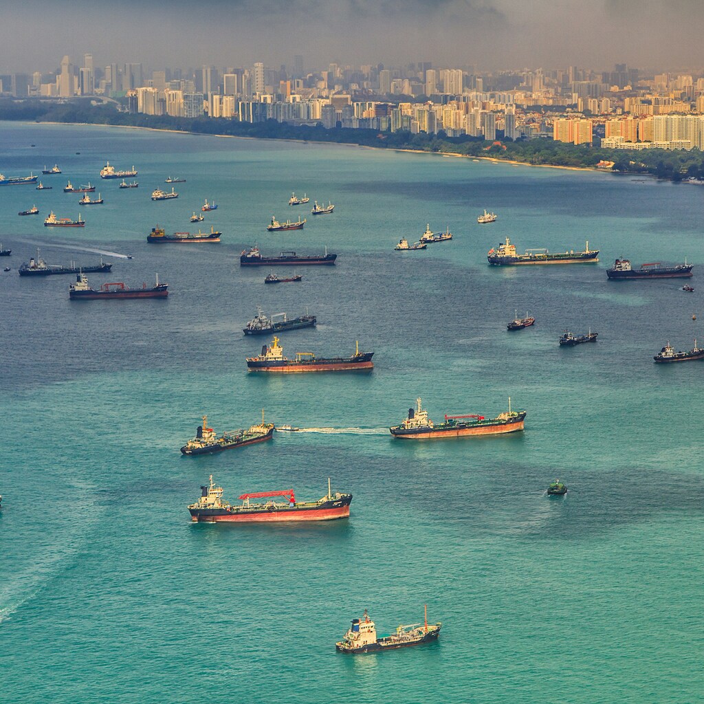 Ships are seen in the harbour.