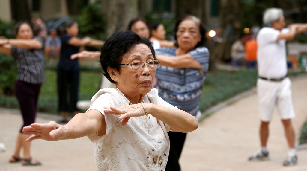 Elderly people exercise at a public park in Hanoi, Vietnam October 9, 2018. REUTERS/Kham. preventive medicine
