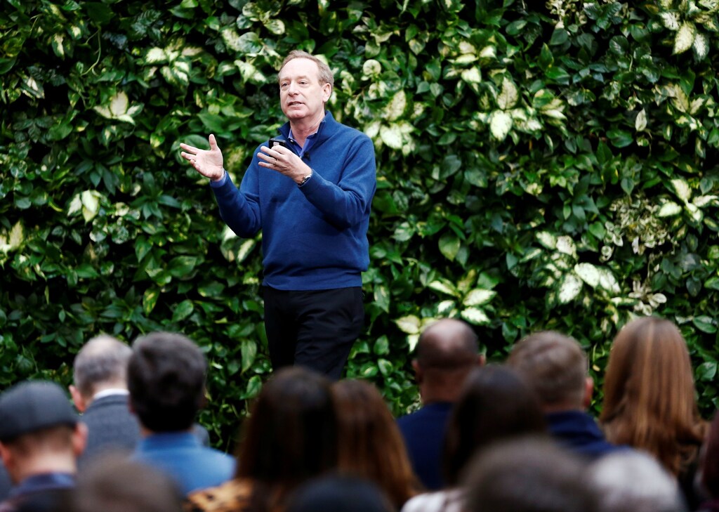 President of Microsoft Brad Smith speaks as the company announces plans to be carbon negative by 2030 and to negate all the direct carbon emissions ever made by the company by 2050 at their campus in Redmond, Washington, U.S., January 16, 2020. REUTERS/Lindsey Wasson - RC26HE9GO37F