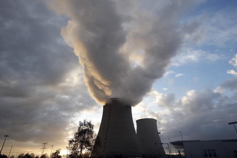 Steam rises at sunset from the cooling towers of the Electricite de France (EDF) nuclear power station at Nogent-Sur-Seine, France, November 13, 2015. The nuclear industry argues world leaders at the COP21 conference in Paris next week should not have to choose between nuclear and renewables but between low-carbon energy, including nuclear, and fossil fuels. Paris will host the World Climate Change Conference 2015 (COP21) from November 30 to December 11. Picture taken November 13, 2015. REUTERS/Charles Platiau TPX IMAGES OF THE DAY - RTX1VT31