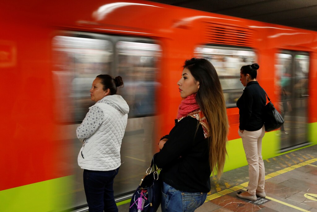 Women wait to board female-only carriages on the Mexico City underground.
