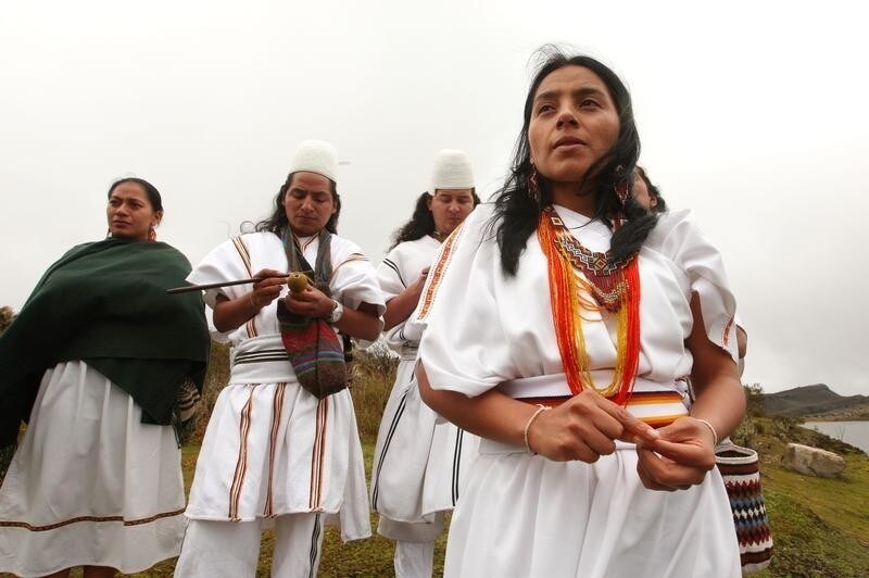 Arhuaco Indian Ati Quigua, a local lawmaker of Bogota DC, attends a ceremony in Los Tunjos lagoon in Sumapaz's National Park April 3, 2009. Arhuacos Indians of the Sierra Nevada de Santa Marta practiced ceremony in the lagoon that is considered the most important source of water in the country. The Mamo, a spiritual leader, accompanied by six Indians, staged an ancient ritual to convince the government to preserve water in this area of the country, which was controlled by leftist FARC rebels two years ago before the army retook the area. Picture taken on April 3, 2009.