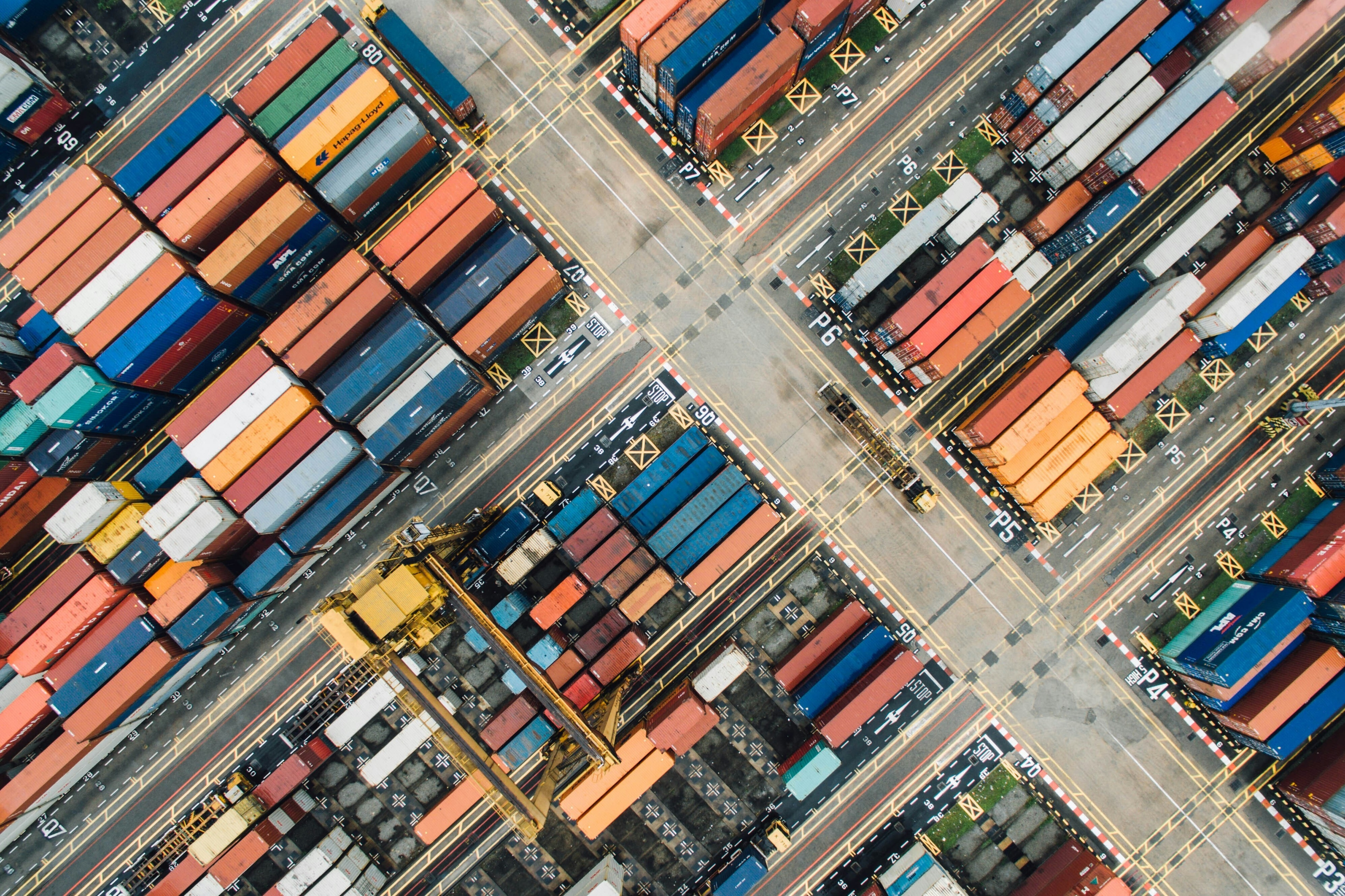 A bird's eye view of a container park, illustrating the logistics of global trade