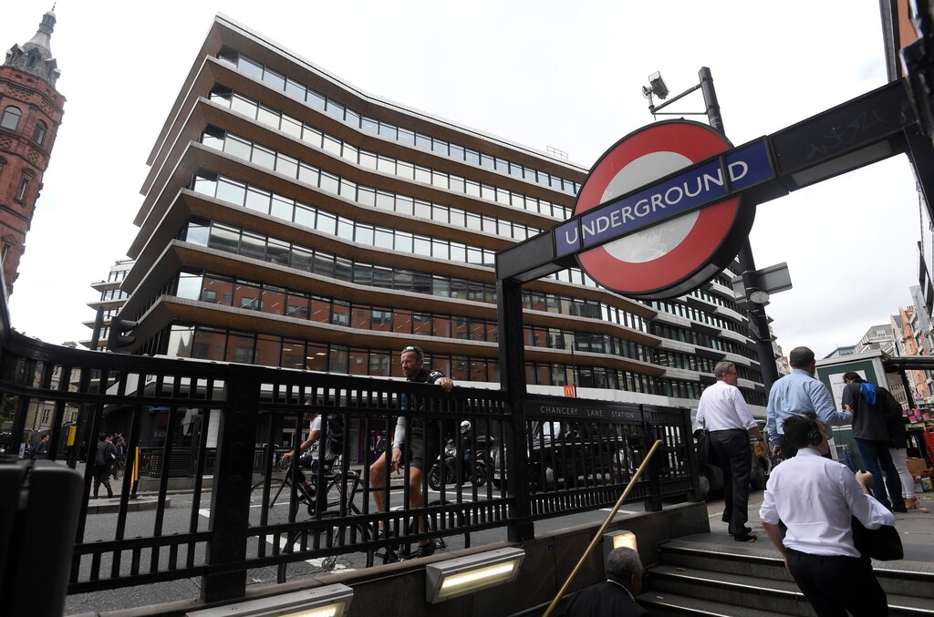 An office building containing the London headquarters of the PR company Bell Pottinger is seen behind an entrance to an underground train station in London, September 5, 2017. REUTERS/Toby Melville - RC1D7253BDA0