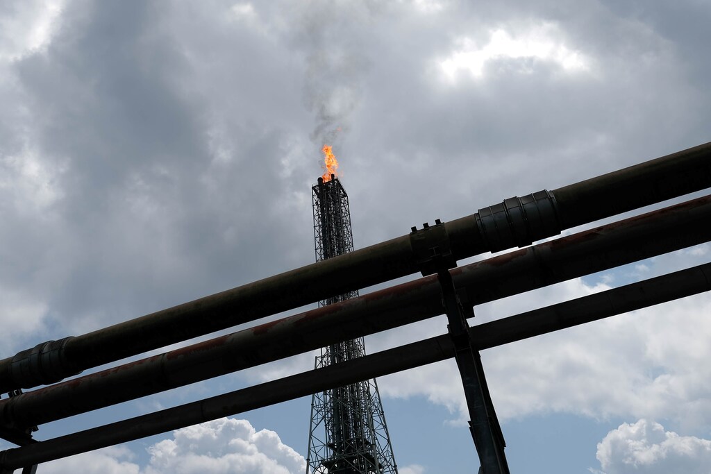 A view shows a tower flaring gas at an LNG processing plant operated by Shell and others in Bonny Island, in Rivers state, Nigeria June 21, 2017. Picture taken June 21, 2017