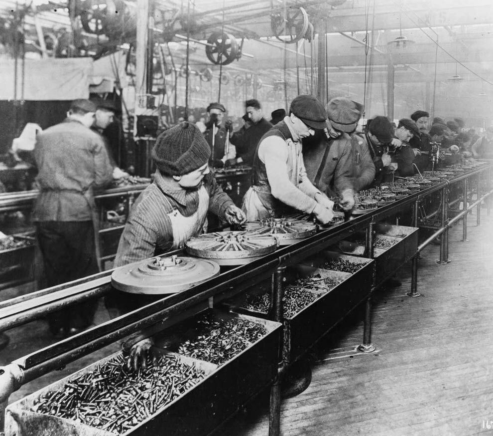 Workers on the Ford assembly line, 1913