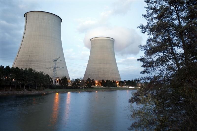 Steam rises from the cooling towers of the Electricite de France (EDF) nuclear power station at Nogent-Sur-Seine, France, November 13, 2015. The nuclear industry argues world leaders at the COP21 conference in Paris next week should not have to choose between nuclear and renewables but between low-carbon energy, including nuclear, and fossil fuels. Paris will host the World Climate Change Conference 2015 (COP21) from November 30 to December 11. Picture taken November 13, 2015. REUTERS/Charles Platiau - PM1EBBN186201