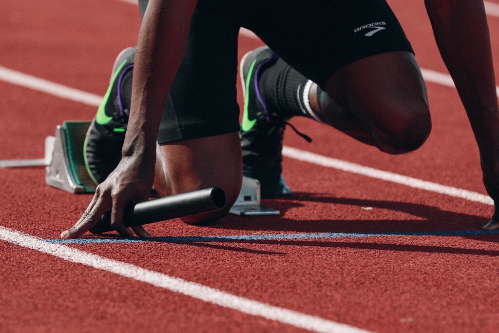 A runner about to start a race.