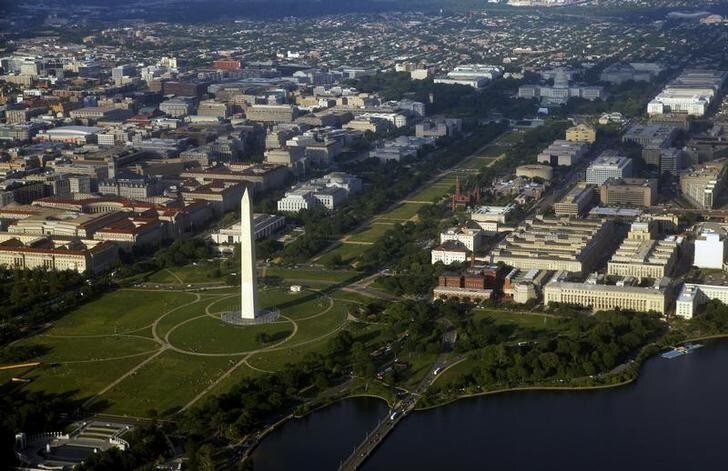 Downtown Washington is seen in an aerial view, May 19, 2011. At bottom left is the World War II memorial with the Washington Monument and National Mall at center and the U.S. Capitol building at upper right. REUTERS/Jim Bourg (UNITED STATES - Tags: CITYSCAPE POLITICS)