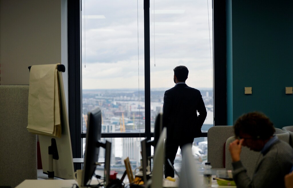 A UBS employee works in the UBS "fintech lab" at Canary Wharf in London, Britain, October 19, 2016. REUTERS/Hannah McKay - RTX2PJIO