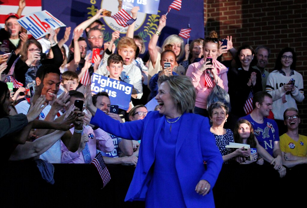 U.S. Democratic presidential candidate Hillary Clinton waves to her supporters before her speech during a rally at Louisville Slugger Field's Hall of Fame Pavilion in Louisville, Kentucky