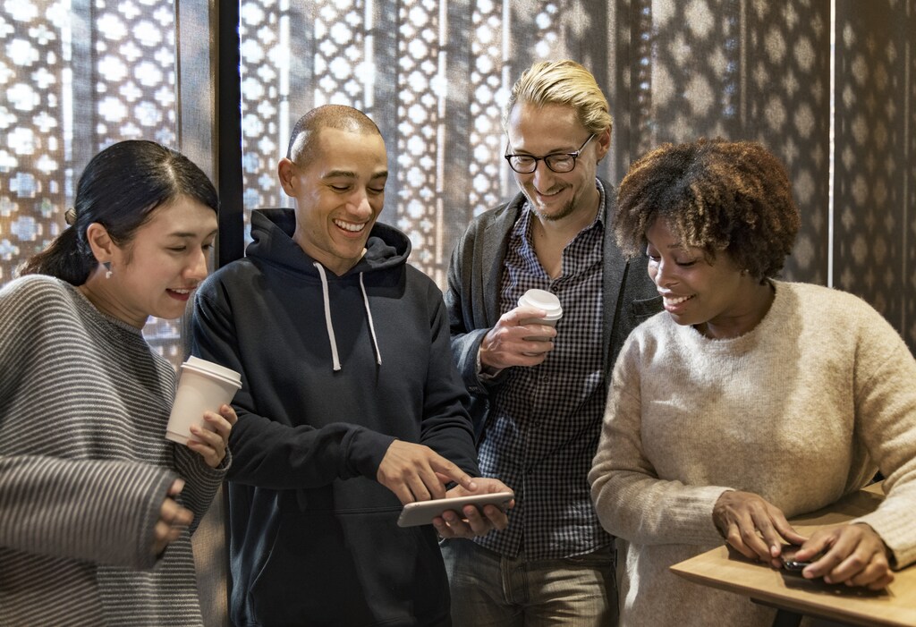 Friends looking at a smartphone