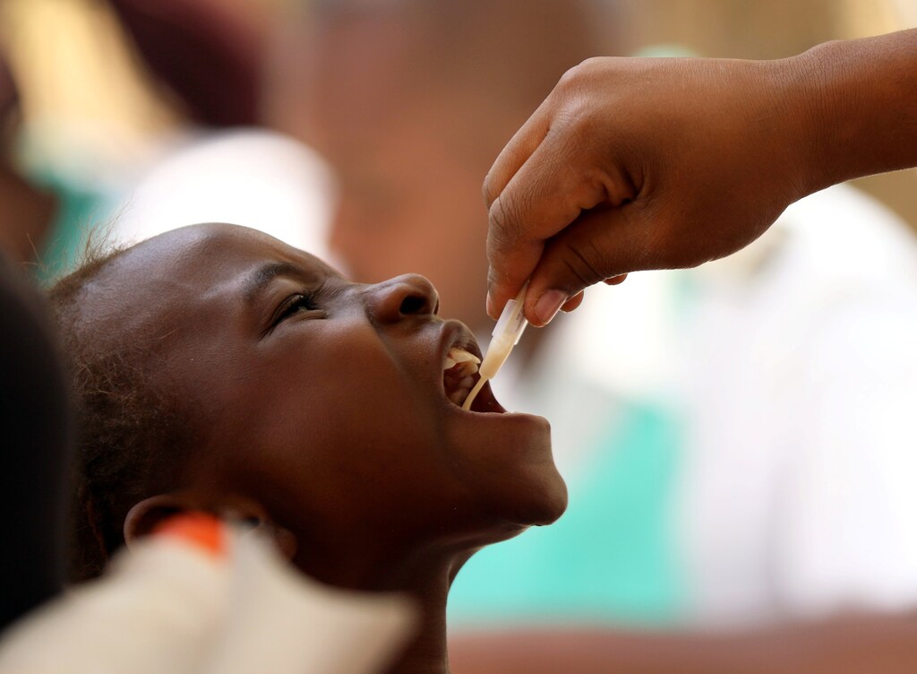 A child receives a cholera vaccination at a clinic in Harare, Zimbabwe, on 4 October 2018.