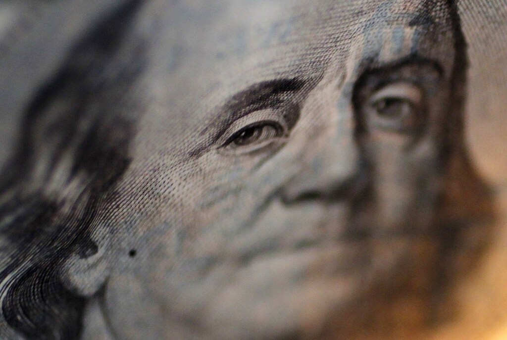 A portrait of Benjamin Franklin on a U.S. One-hundred dollar bill is pictured at Interbank Inc. money exchange in Tokyo, in this September 9, 2010 picture illustration. The dollar neared a 15-year low versus the yen on Thursday as traders bet Japanese authorities were not yet ready to intervene in the currency market. REUTERS/Yuriko Nakao (JAPAN - Tags: BUSINESS EMPLOYMENT) - RTR2I3FR