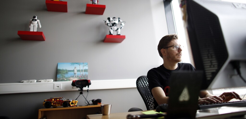 An employee of IT Company CCP works at the company's head office in Reykjavik February 13, 2013.