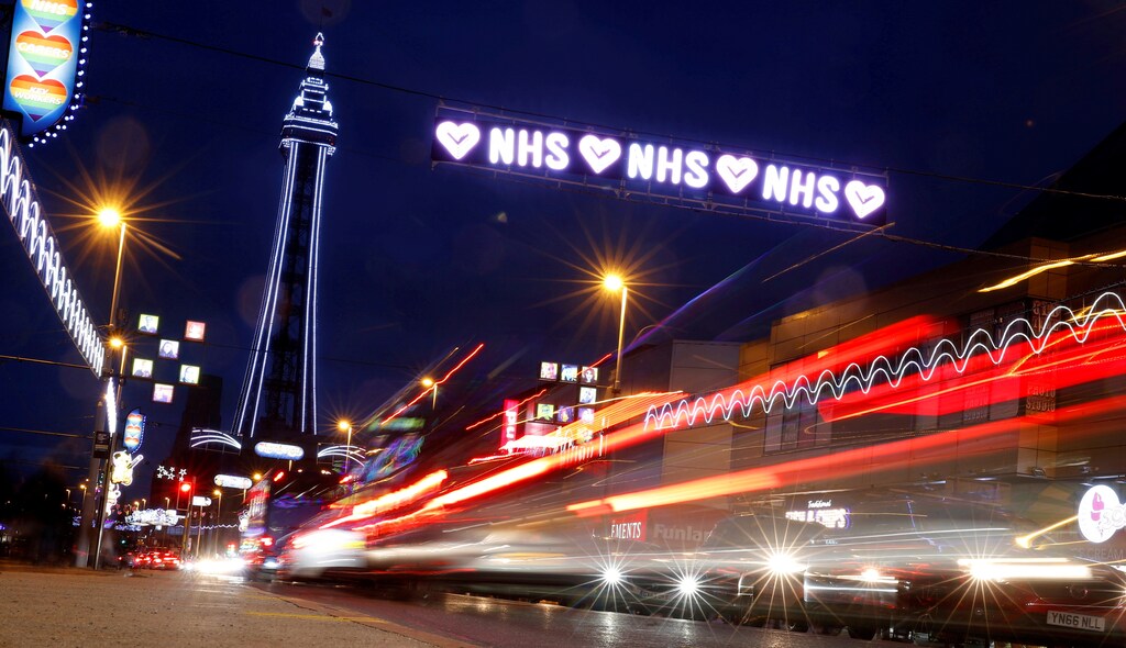 Cars pass under a tribute to Britain's NHS (National Health Service) as part of the Illuminations in Blackpool, Britain, September 5, 2020. REUTERS/Phil Noble