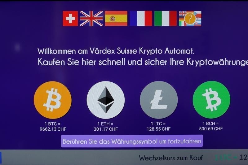 The exchange rates and logos of Bitcoin (BTH), Ether (ETH), Litecoin (LTC) and Bitcoin Cash (BCH) are seen on the display of a cryptocurrency ATM of blockchain payment service provider Vaerdex at the headquarters of Swiss Falcon Private Bank in Zurich, Switzerland May 29, 2019. REUTERS/Arnd Wiegmann - RC19BCBC64B0