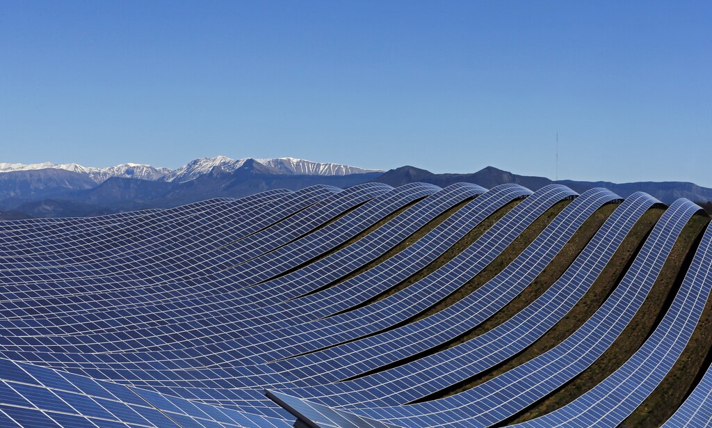 A general view shows solar panels to produce renewable energy at the photovoltaic park in Les Mees, in the department of Alpes-de-Haute-Provence, southern France March 31, 2015. The solar farm of the Colle des Mees, the biggest in France, consists of 112,780 solar modules covering an area of 200 hectares of land and representing 100 MW of power.