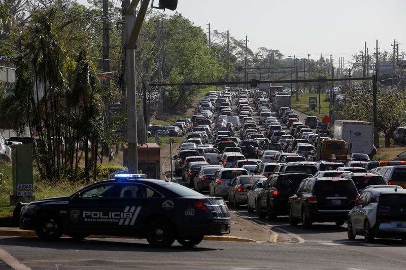 Traffic is seen along Puerto Rico Highway 2 caused by a construction site at a sinkhole caused by Hurricane Maria outside San Juan, Puerto Rico, October 12, 2017. REUTERS/Shannon Stapleton - RC13E5EE3540