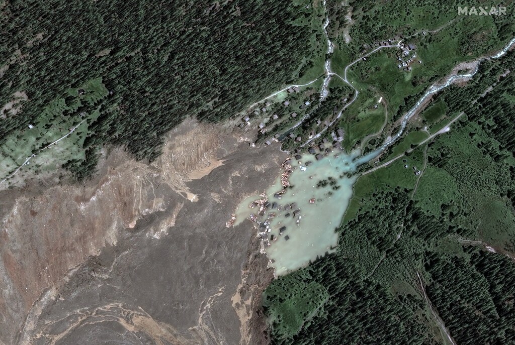 A satellite image shows the closer view of Blatten after a glacier in the Swiss Alps partially collapsed and tumbled onto the village, in Blatten, Switzerland May 29, 2025. Maxar Technologies/Handout via REUTERS THIS IMAGE HAS BEEN SUPPLIED BY A THIRD PARTY. NO RESALES. NO ARCHIVES. MANDATORY CREDIT. MUST NOT OBSCURE LOGO.