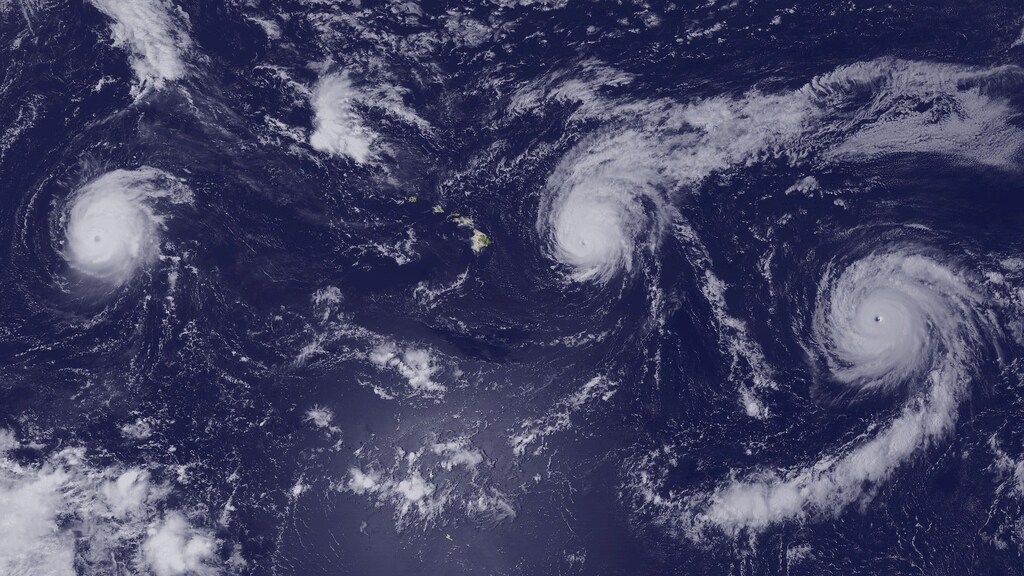 Hurricanes gather force over the Pacific Ocean