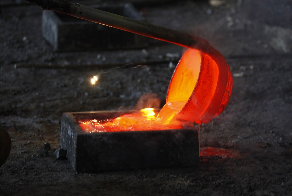 Molten rare earth metal Lanthanum is poured into a mould at Jinyuan Company's smelting workshop near the town of Damao in China's Inner Mongolia Autonomous Region October 31, 2010. The near monopoly China has in producing 97 percent of the world's supply of rare earths has been well-known among industrial users for years, but came under the international spotlight after reports Beijing halted shipments to Japan over a territorial dispute with Tokyo last month