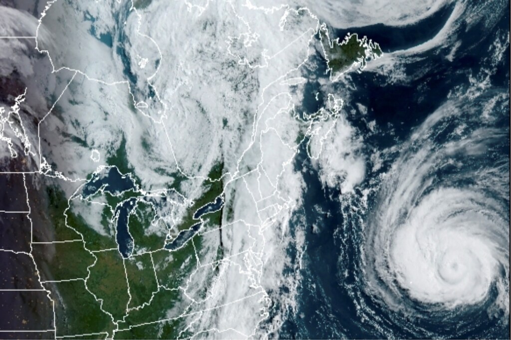 A satellite image shows Hurricane Larry in the Atlantic Ocean, moving north towards the Canadian Atlantic province of Newfoundland and Labrador.