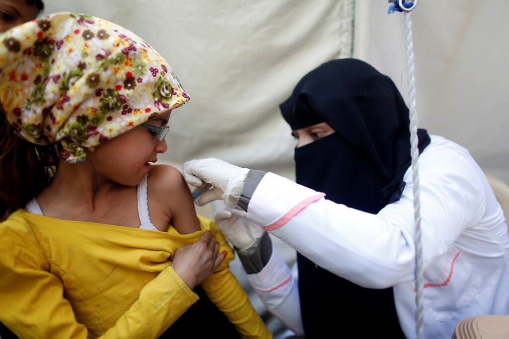 A girl receives a diphtheria vaccine during a vaccination campaign in Sanaa, Yemen