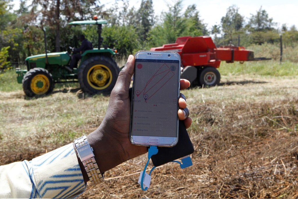 A mobile phone application shows movements of a John Deere 5503 tractor, installed with the Hello Tractor technology that connects farmers with vehicles' owners, in Umande village in Nanyuki, Kenya February 4, 2020. Picture taken February 4, 2020. REUTERS/Njeri Mwangi - RC2F7F9WHWYX