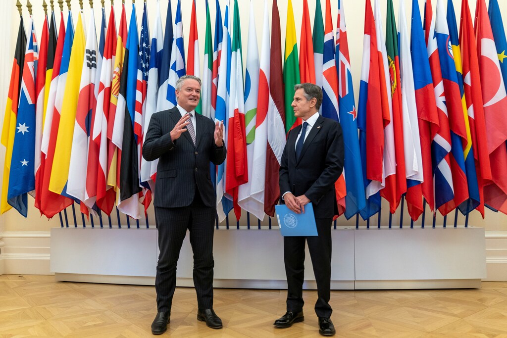 Secretary-General of the Organisation for Economic Cooperation and Development (OECD) Mathias Cormann, of Australia, accompanied by U.S. Secretary of State Antony Blinken, speaks at OECD headquarters in Paris, France, June 25, 2021. Andrew Harnik/Pool via REUTERS - RC2K7O94SDAR