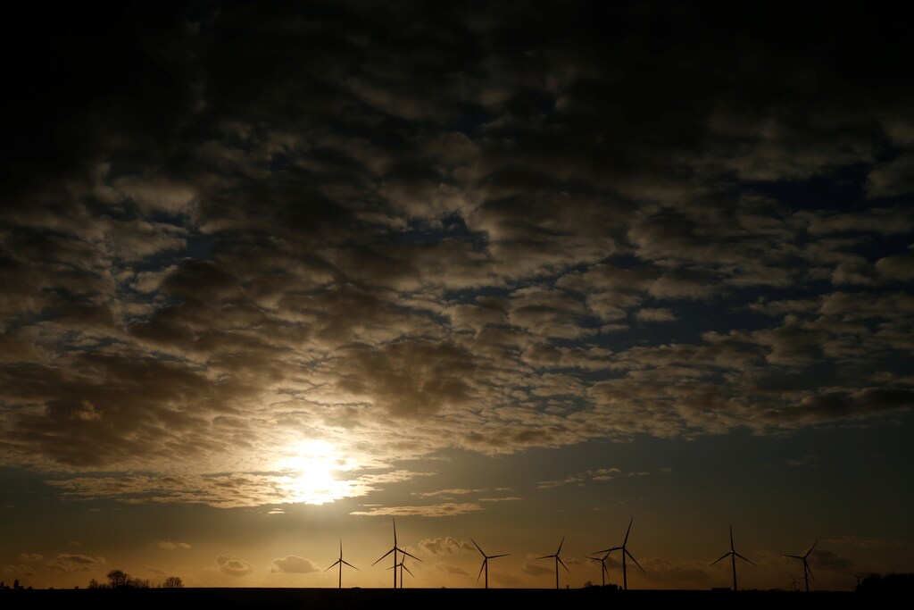 Power-generating windmill turbines are seen at a wind park in Flesquieres near Cambrai, France March 3, 2020. REUTERS/Pascal Rossignol - RC2JCF9MLIJJ