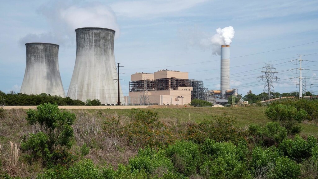 Some cities are trying to make coal-burning plants like this one a thing of the past.