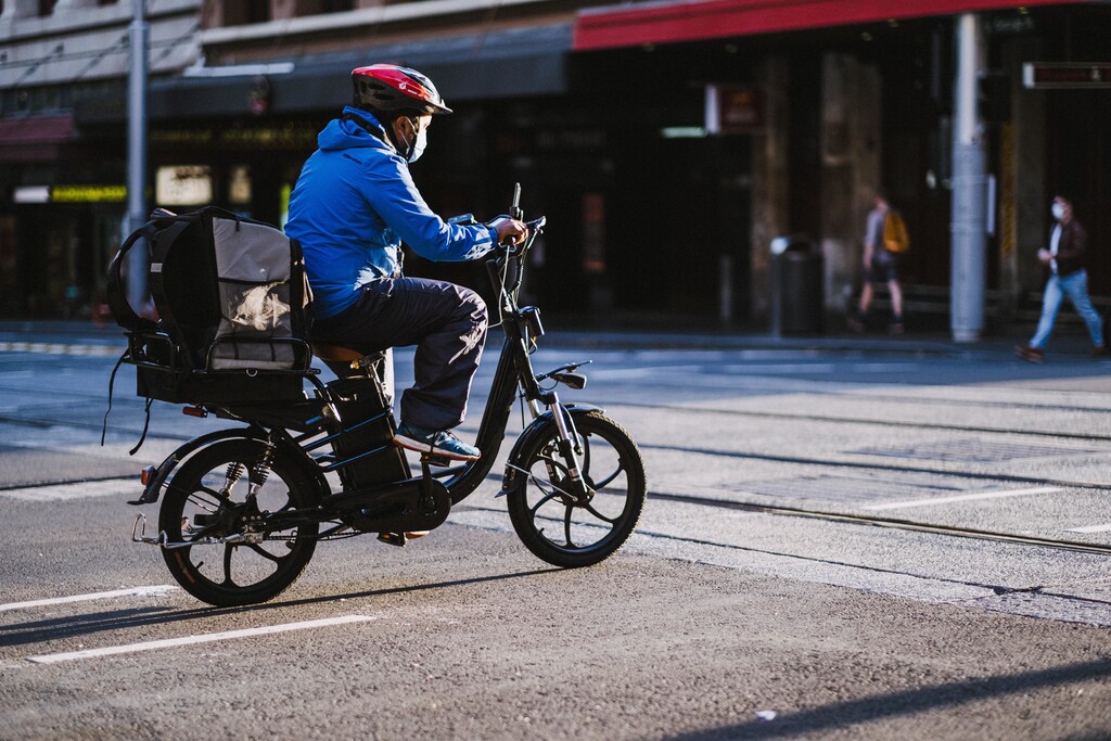 deliveryman in face mask during the coronavirus lockdown