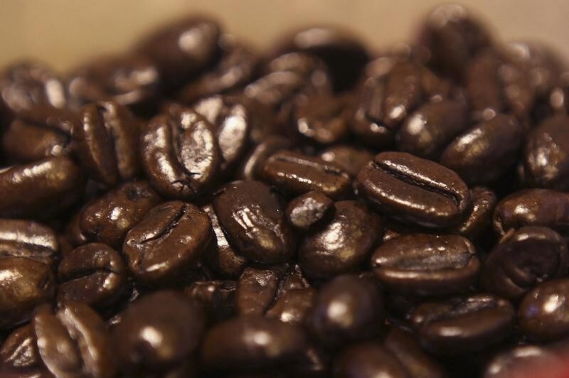Coffee beans are seen at a Nairobi Java House outlet in Nairobi January 21, 2012. Kenya's rich and new middle classes have a growing taste for coffee and ice cream. That's just one sign that African states such as Kenya are changing. Even as rich countries face slowdown, sub-Saharan African economies are expected to post nearly 6 percent average growth in 2012, according to the IMF. A study by the International Finance Corporation, part of the World Bank, has pointed to the potential of the continent's more than 1 billion people, millions of whom have moved out of subsistence agriculture and into urban jobs over the past decade. Picture taken January 21, 2012. To match Insight AFRICA/SPENDERS-INFLATION REUTERS/Noor Khamis (KENYA - Tags: BUSINESS FOOD SOCIETY) - RTR2WRCF