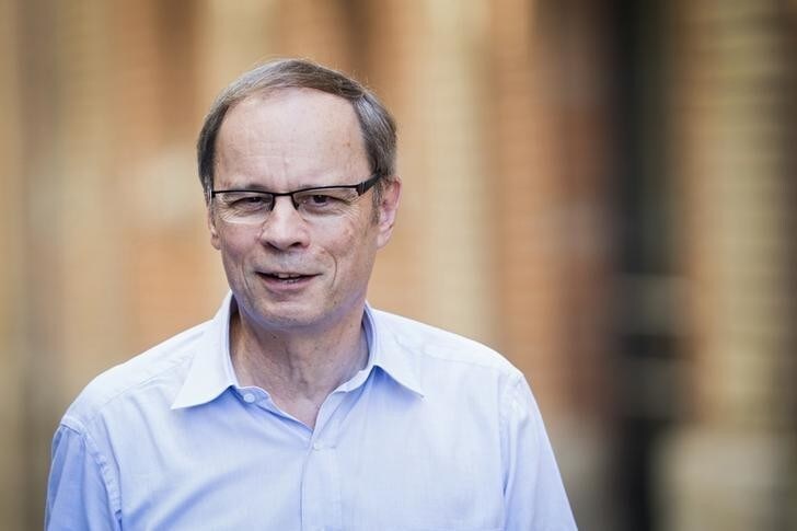 French economist Jean Tirole poses before a news conference at the Toulouse School of Economics in Toulouse October 13, 2014. French economist Jean Tirole won the 2014 economics Nobel Prize for his analysis of market power and regulation, the Royal Swedish Academy of Sciences said on Monday. REUTERS/Fred Lancelot (FRANCE - Tags: BUSINESS EDUCATION SCIENCE TECHNOLOGY HEADSHOT)